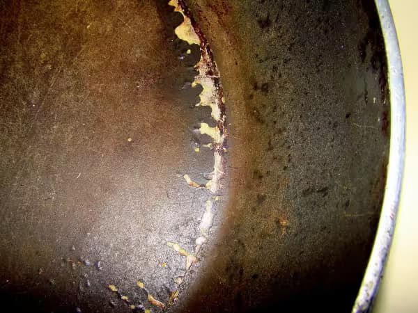 teflon pan coating scraping off